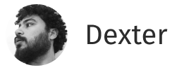 Profile photo of a man with curly hair and beard looking to the left next to the name Dexter on a rounded white background.